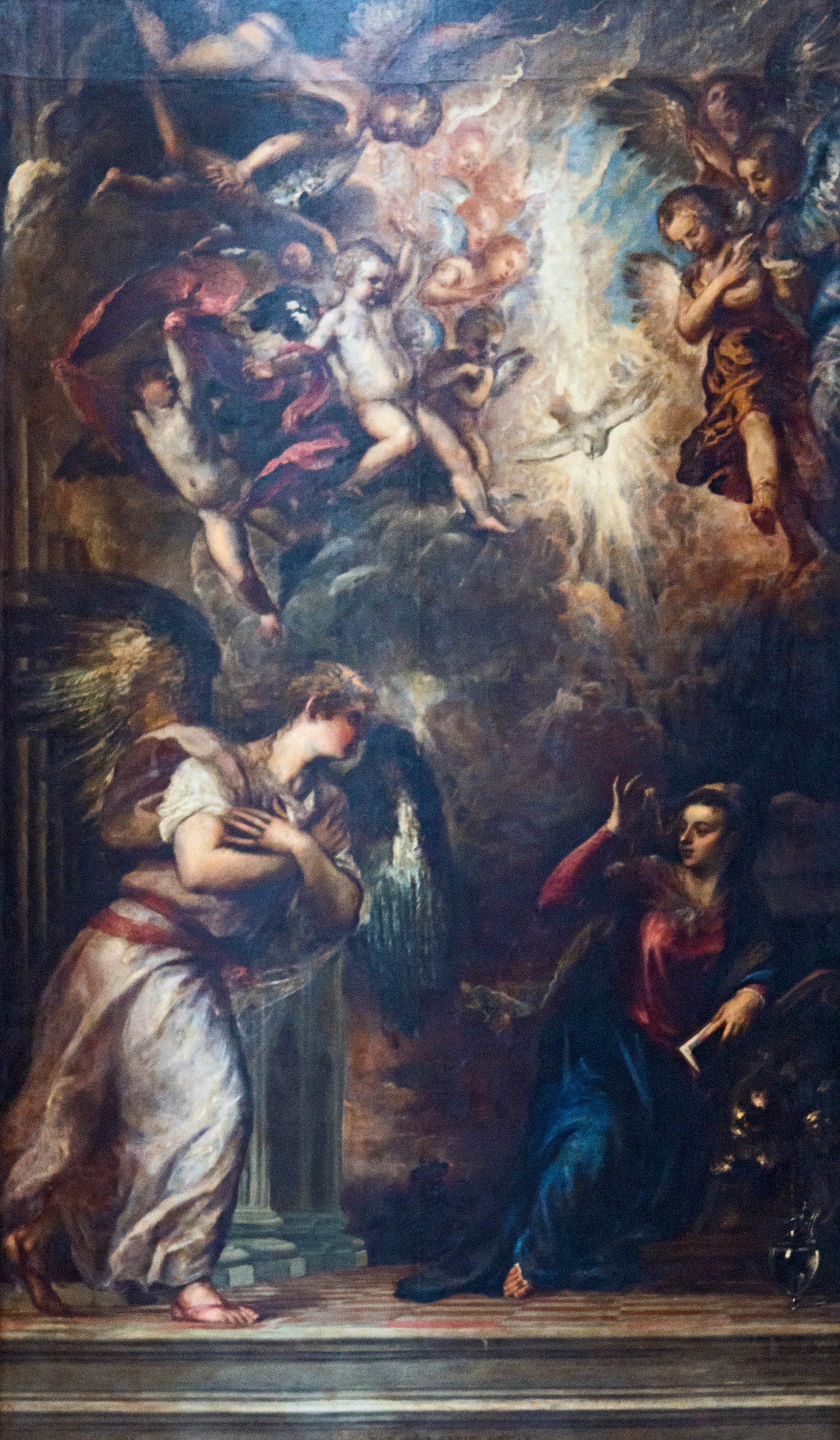 Mystical religious scene with figures and angels in a dark, atmospheric setting. Titian – Annunciation (c. 1563–1566) | San Salvador, Venice