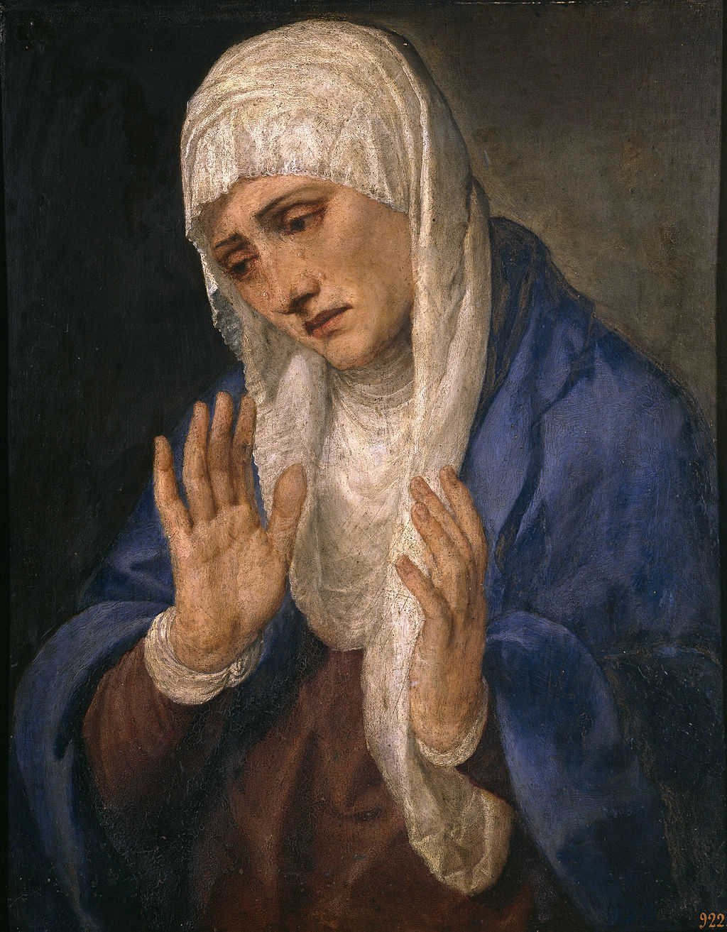 Painting of a woman in a blue robe and white headscarf with hands clasped together. Mater Dolorosa with her Hands Apart by Titian | 1555 Religious Oil Painting Reproduction