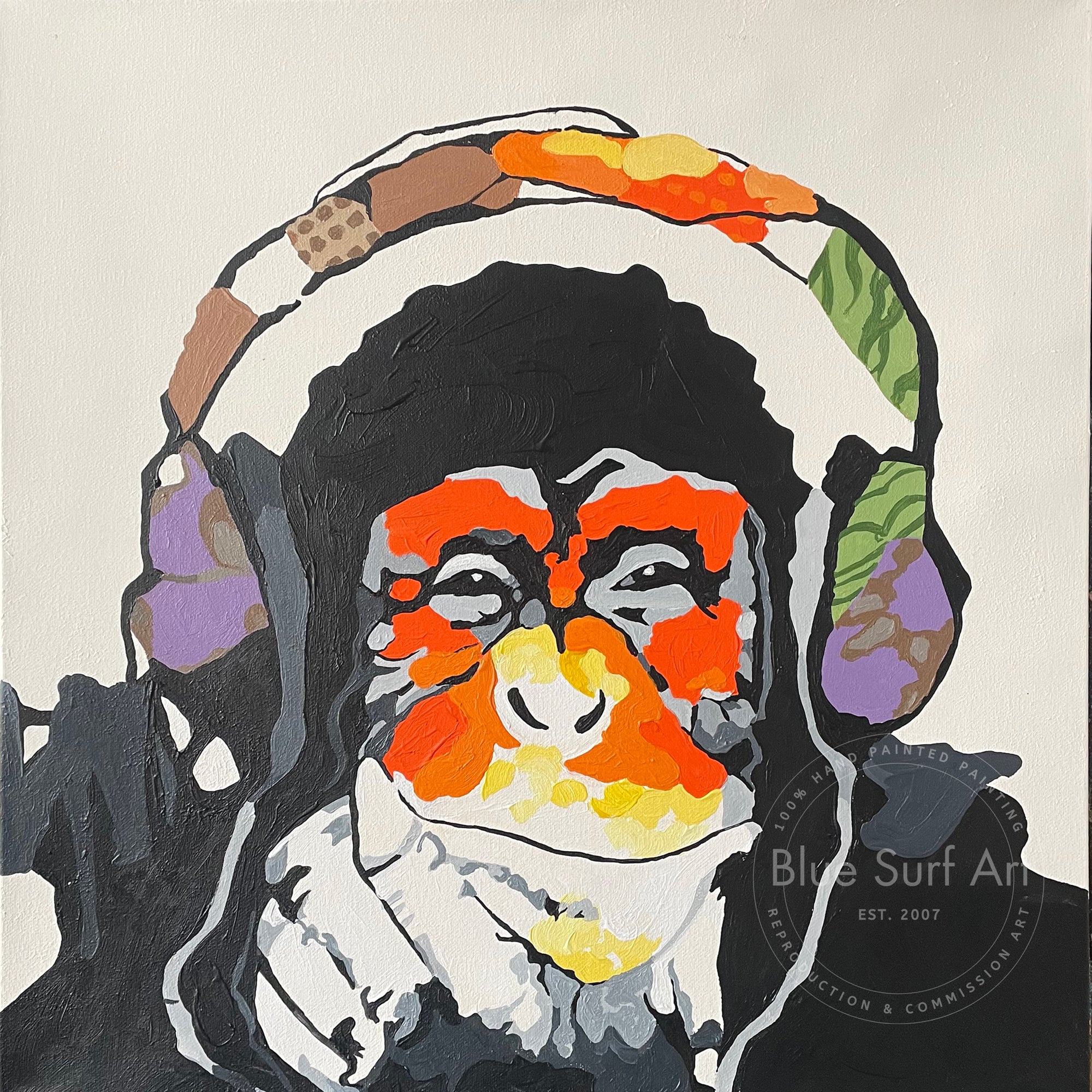 Colorful monkey wearing headphones with 'Blue Surf Art' logo in the corner