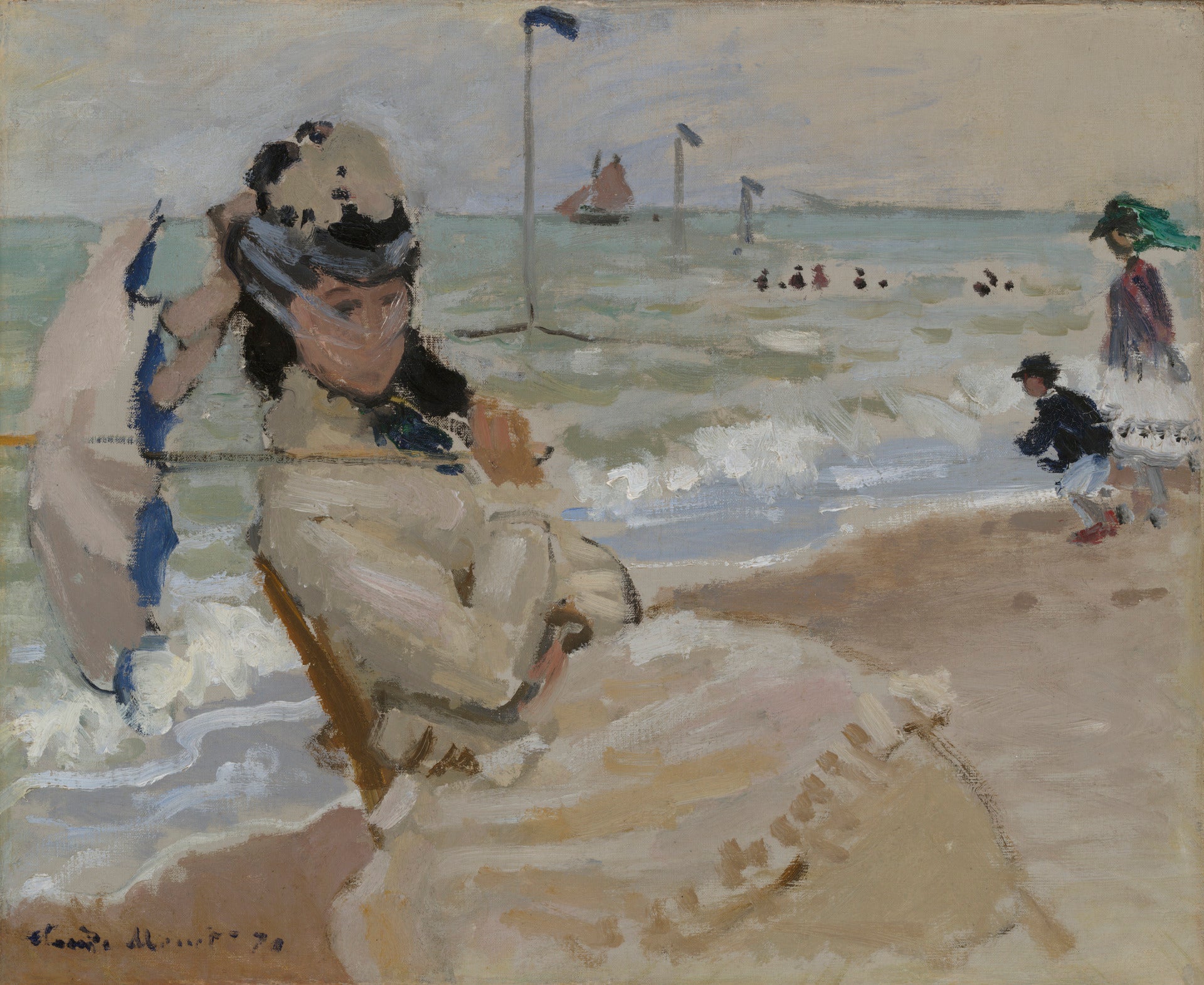 Camille on the Beach at Trouville by Claude Monet