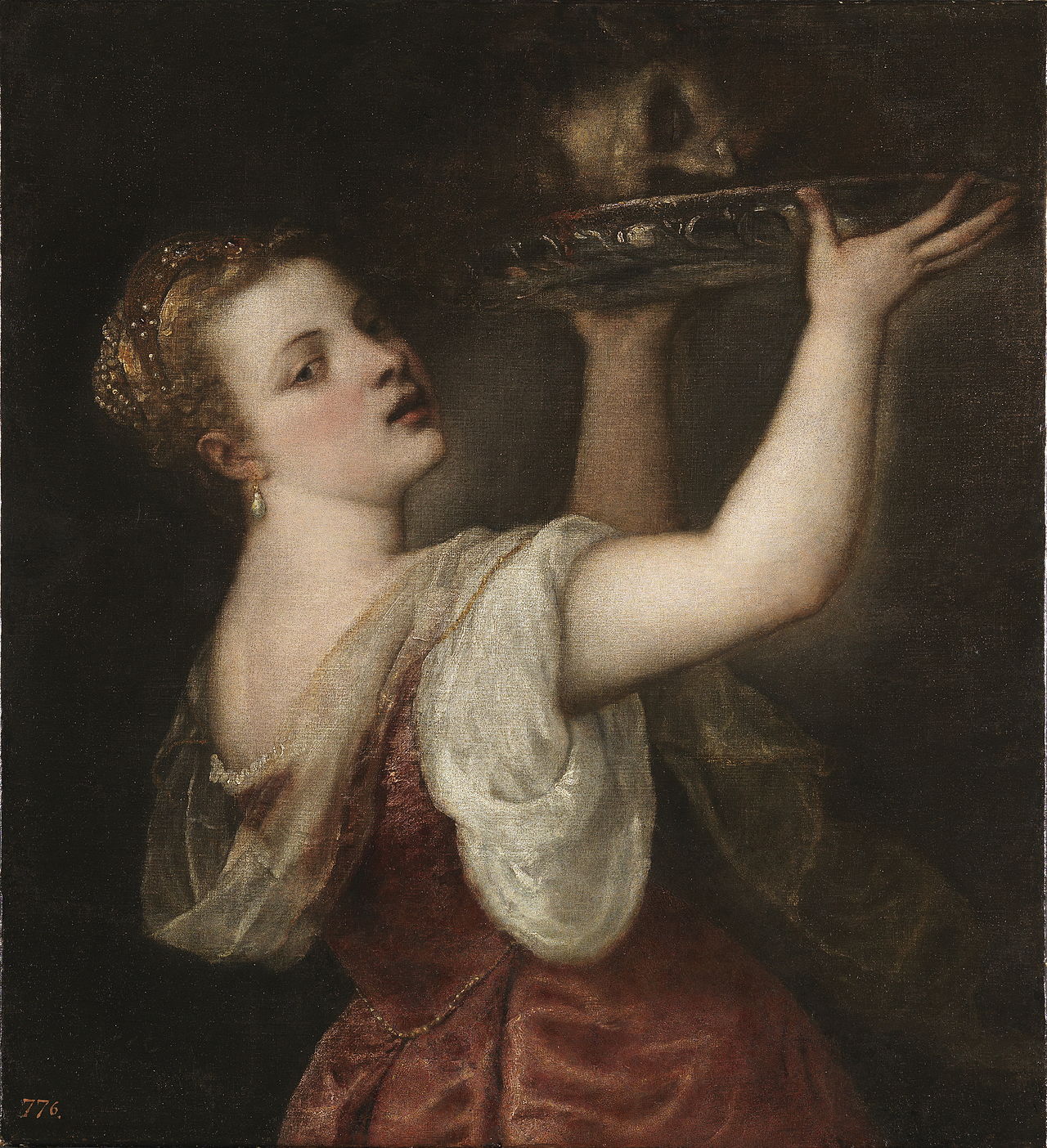 Salome with the Head of John the Baptist by Titian | Prado Museum Madrid
. Painting of a woman in a red dress holding a tray above her head against a dark background