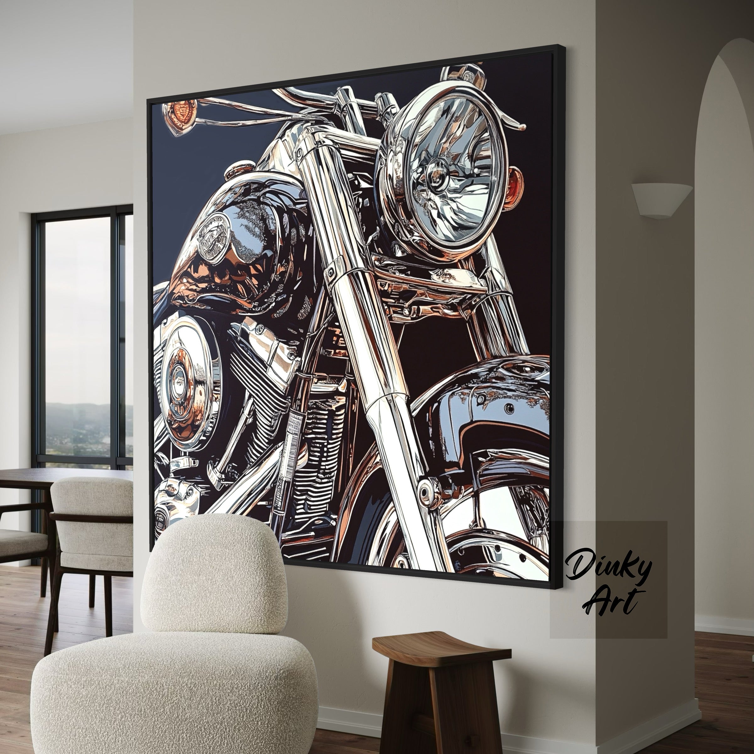 Framed artwork of a motorcycle on a wall in a room with a chair and table.