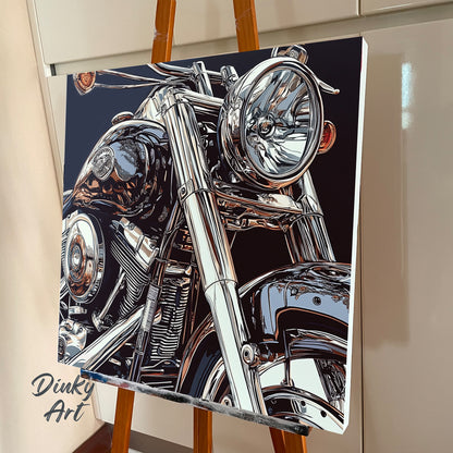 Close-up of a motorcycle on a stand with 'Dinky Art' branding.