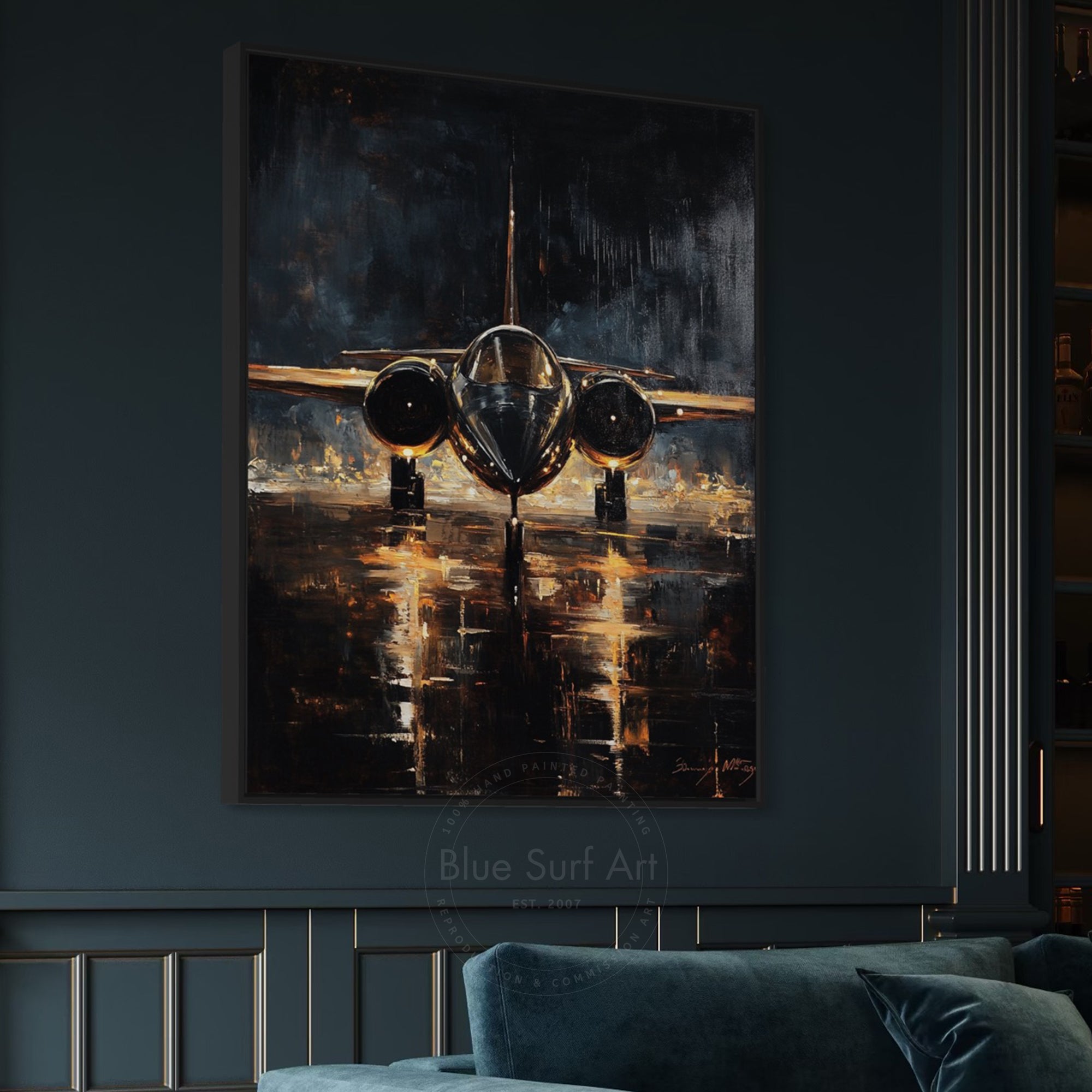 Abstract painting of an airplane on a dark wall above a sofa