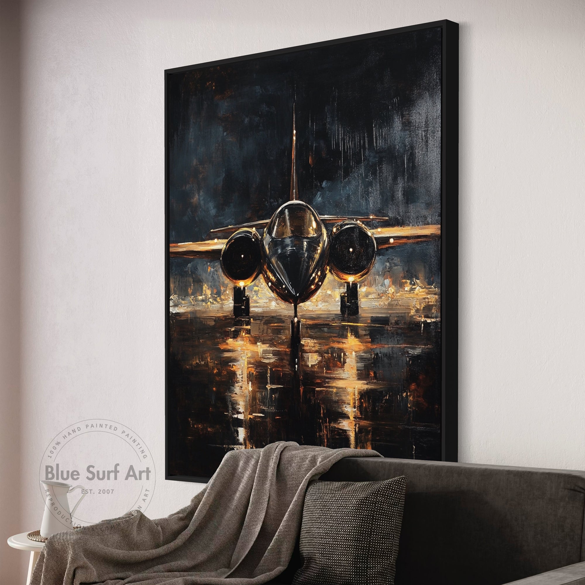 Abstract painting of an airplane on a wall above a sofa