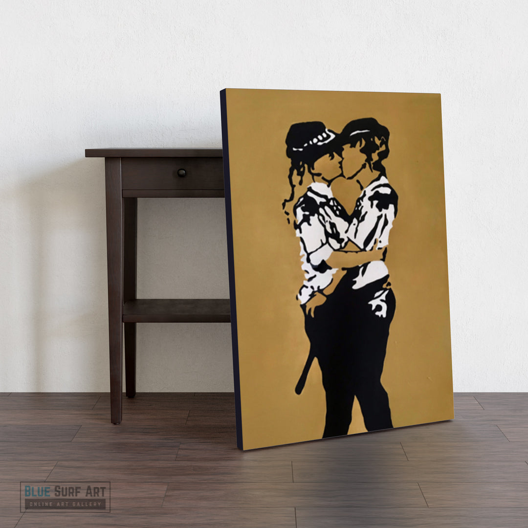 Canvas print of a stylized illustration of two people embracing on a brown background, leaning against a wooden table.  Iconic Kissing Coppers Reproduction Hand-Painted Oil on Canvas