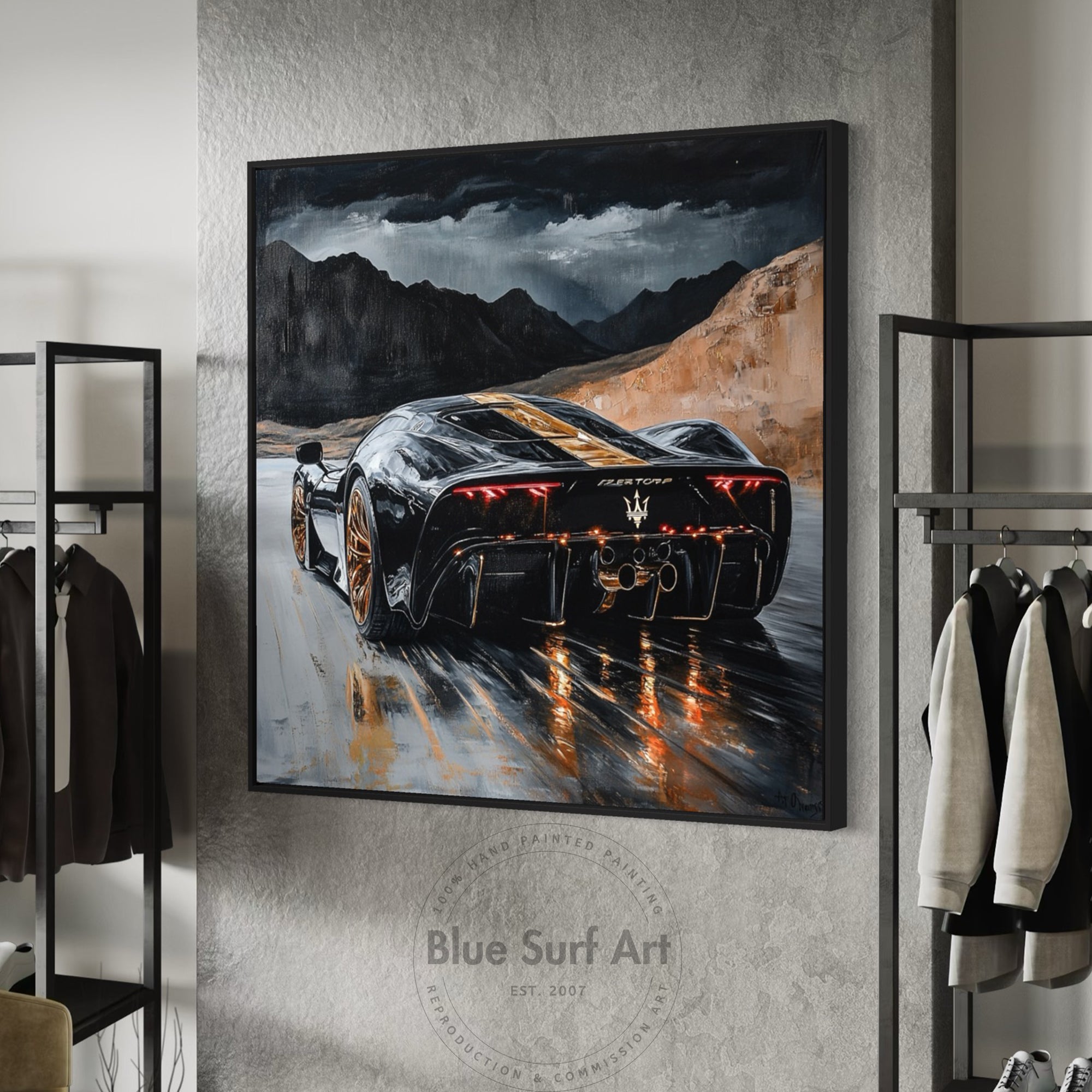 Framed painting of a sports car on a mountain road in a modern interior setting.